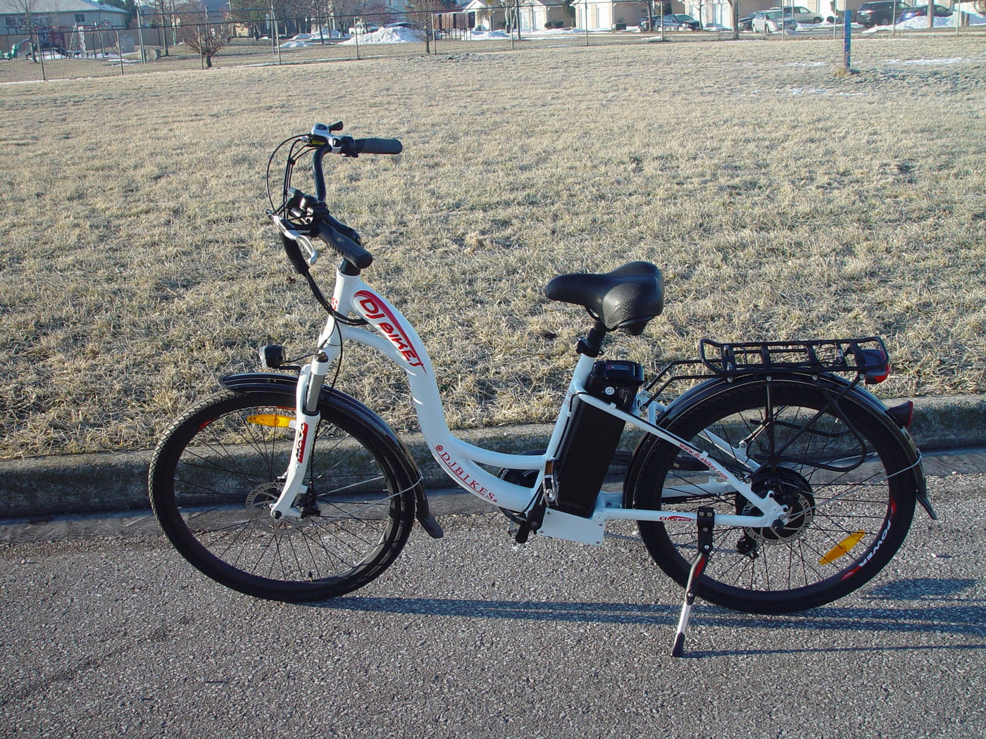 A DJ City Bike e-bike on a paved path